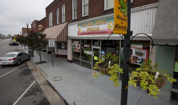 A row of Hispanic-owned businesses are closed in Albertville, Alabama, Wednesday, October 12, 2011. Dozens of businesses across the state shut down as Hispanics took a day off from work to protest against Alabama's tough new immigration law. (AP/Dave Martin)