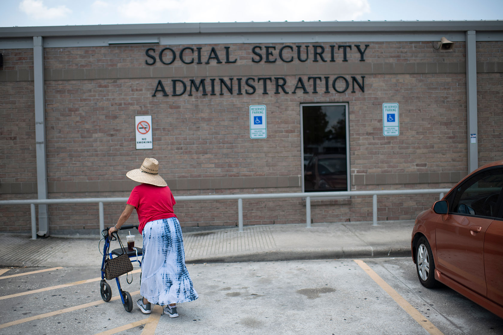 A woman walks into a Social Security office in Houston.